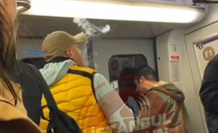 Metroda sigara içip kendisini uyaranlara küfür etti
